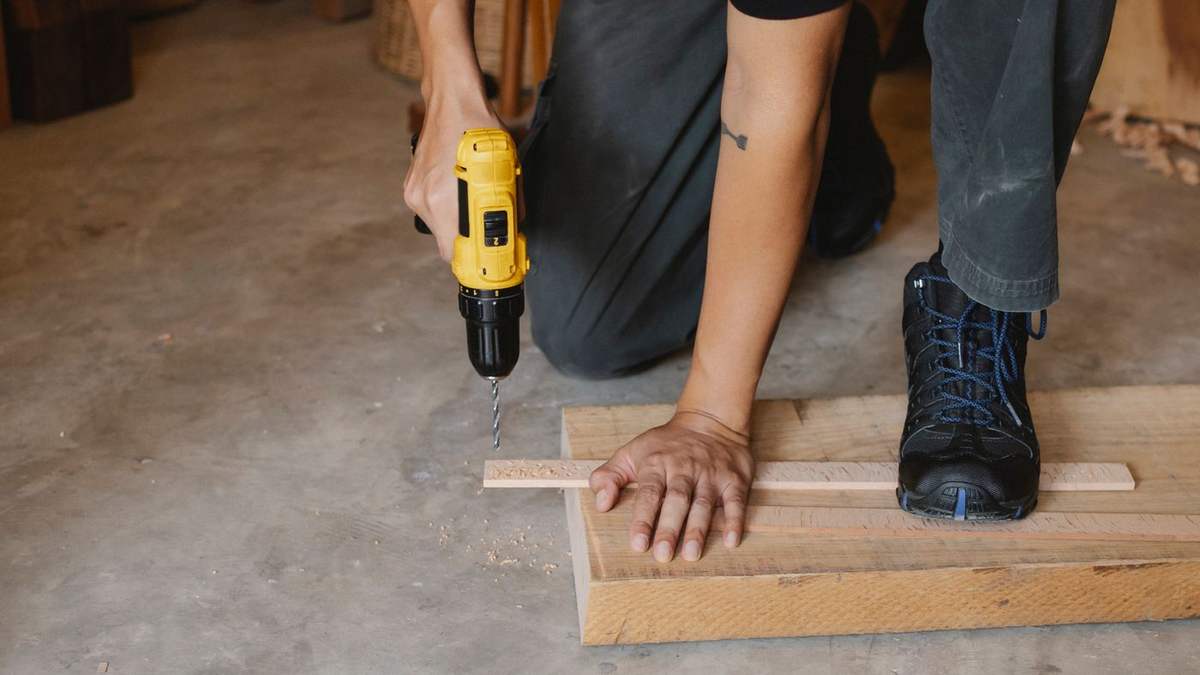Drilling into a floor joist during crawl space framing repair