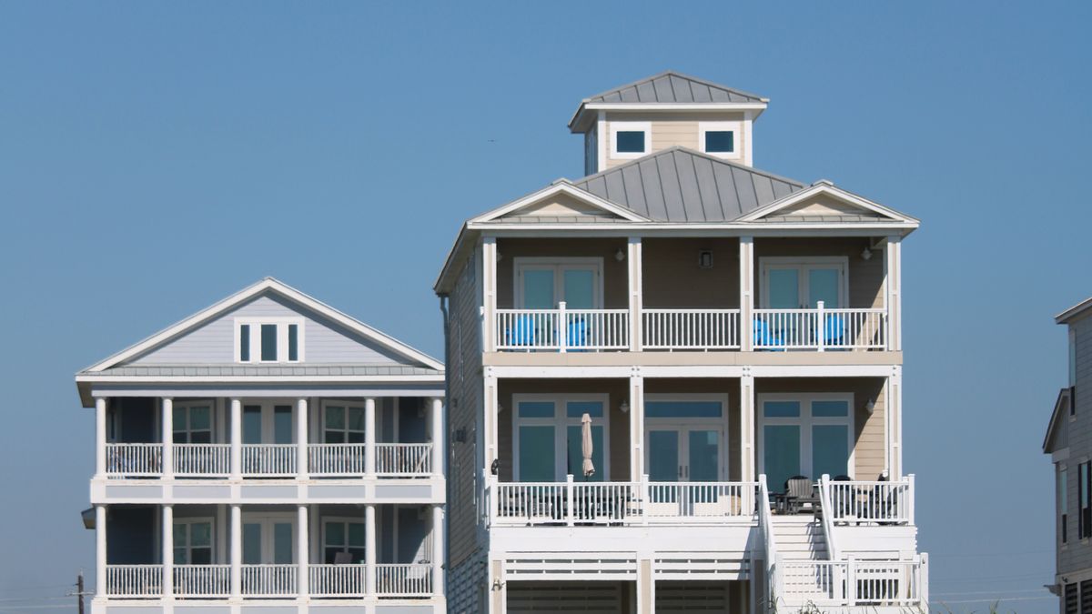 Beachfront house raised on pilings above the dune line